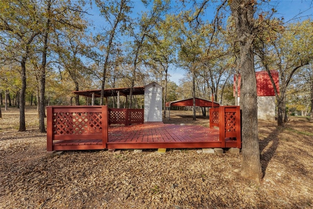 wooden terrace with a carport