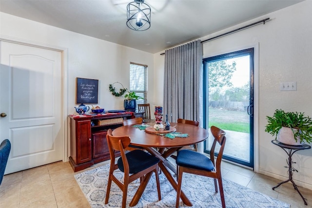 view of tiled dining space