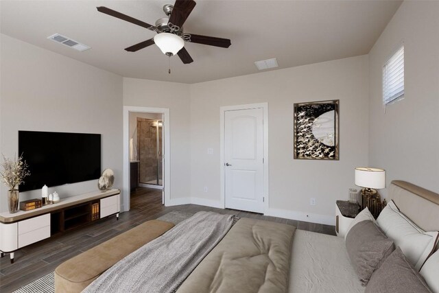 bedroom featuring ensuite bath, ceiling fan, and dark hardwood / wood-style floors