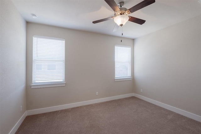 unfurnished room featuring carpet flooring and ceiling fan