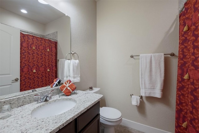 bathroom featuring tile patterned flooring, a shower with curtain, vanity, and toilet