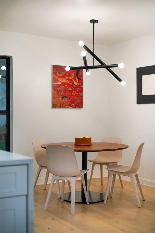 dining area with light wood-type flooring