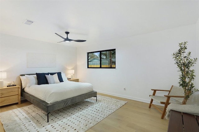 bedroom featuring ceiling fan and light hardwood / wood-style floors