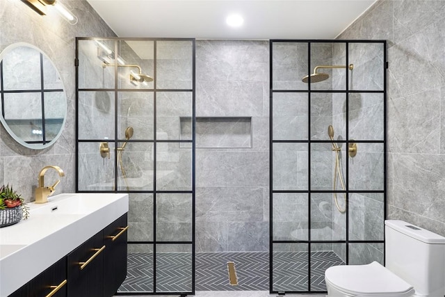 bathroom with tiled shower, tile walls, and toilet