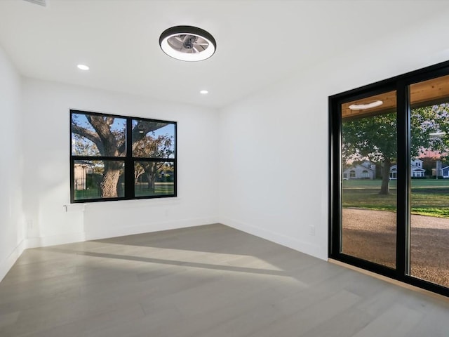 spare room featuring hardwood / wood-style flooring