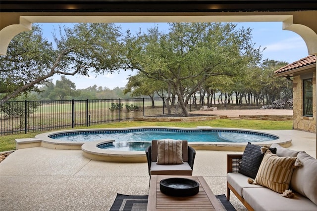 view of pool featuring a patio area, an in ground hot tub, and an outdoor hangout area