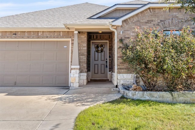 doorway to property featuring a garage