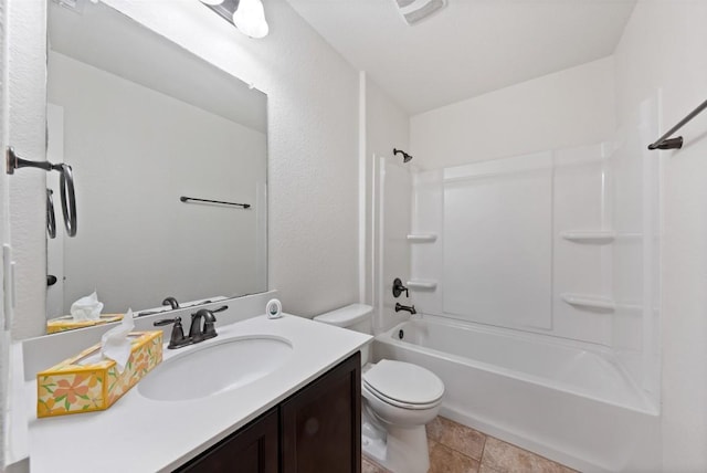 full bathroom featuring tile patterned flooring, vanity, toilet, and shower / washtub combination