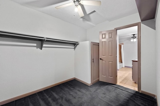 20024 W Lakeshore Dr, Magnolia, TX 77355 - spacious closet with carpet flooring and a ceiling fan