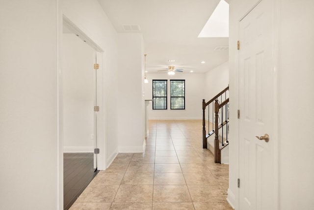 11125 Bastogne Loop, Austin, TX 78739 - hallway with recessed lighting, stairway, and light tile patterned floors