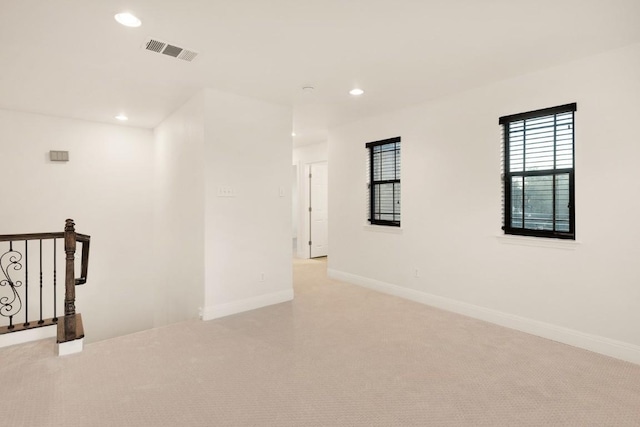 11125 Bastogne Loop, Austin, TX 78739 - spare room featuring recessed lighting and light carpet