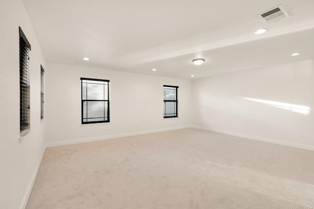 11125 Bastogne Loop, Austin, TX 78739 - empty room featuring light carpet, recessed lighting, and baseboards