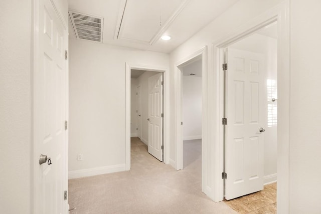 11125 Bastogne Loop, Austin, TX 78739 - corridor featuring light colored carpet, attic access, and recessed lighting