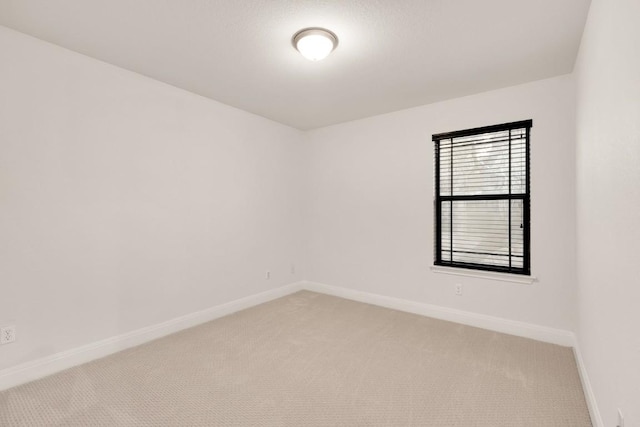 11125 Bastogne Loop, Austin, TX 78739 - empty room featuring light colored carpet and baseboards