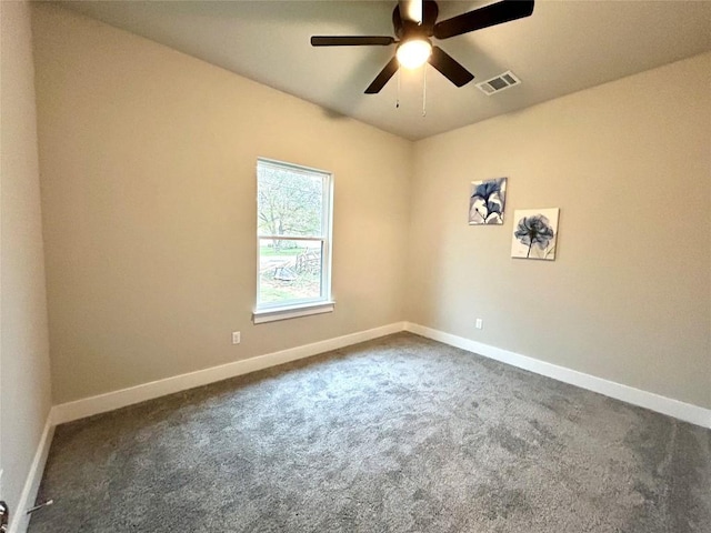 carpeted empty room with ceiling fan