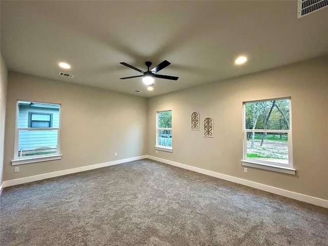 carpeted empty room with ceiling fan