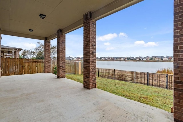 view of patio / terrace featuring a water view