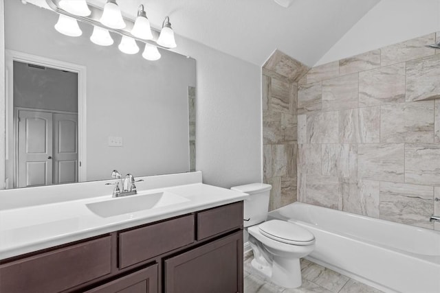 full bathroom with vanity, tub / shower combination, toilet, and lofted ceiling