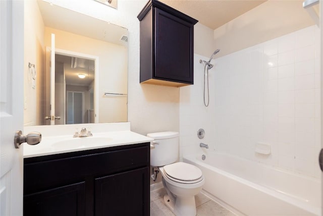 full bathroom with tile patterned floors, vanity, toilet, and tiled shower / bath combo