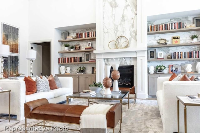 living room featuring a fireplace