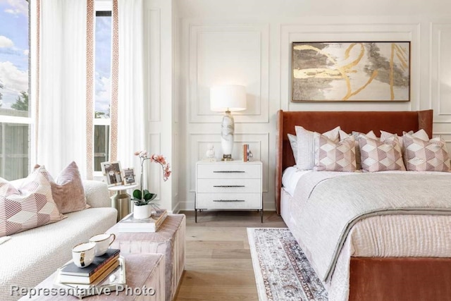 bedroom with light wood-type flooring