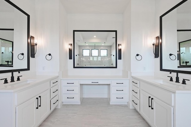790 Old Stone Rd, Austin, TX 78737 - full bathroom featuring a stall shower, two vanities, and a raised ceiling