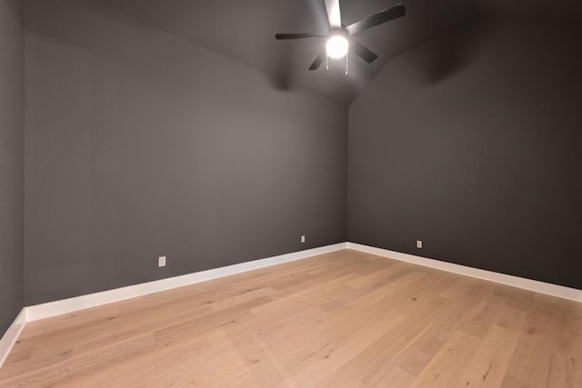 790 Old Stone Rd, Austin, TX 78737 - spare room with ceiling fan, vaulted ceiling, baseboards, and light wood-style flooring