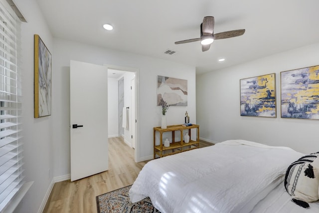 bedroom featuring ceiling fan and light hardwood / wood-style floors