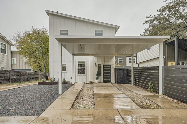 exterior space with a carport