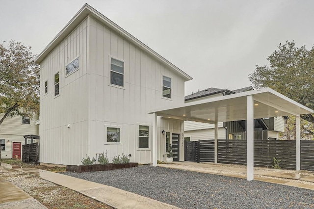 view of front of property with a carport