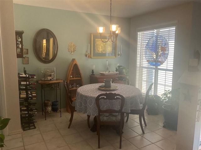 tiled dining area with a notable chandelier