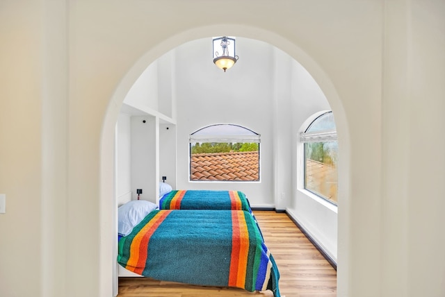 bedroom with hardwood / wood-style floors