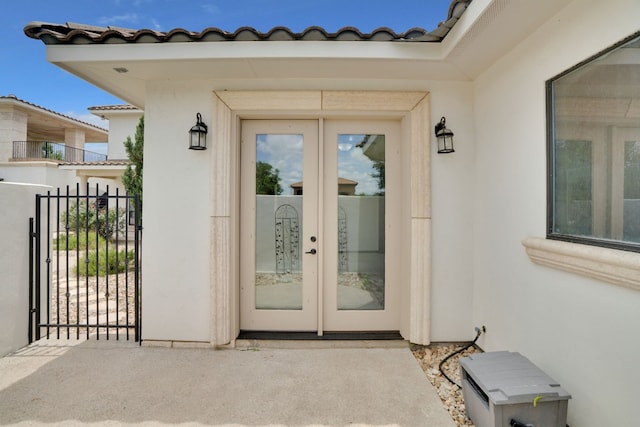 doorway to property featuring french doors