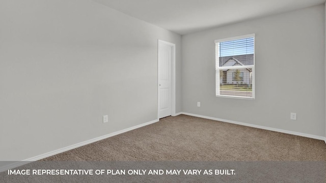 unfurnished room featuring carpet