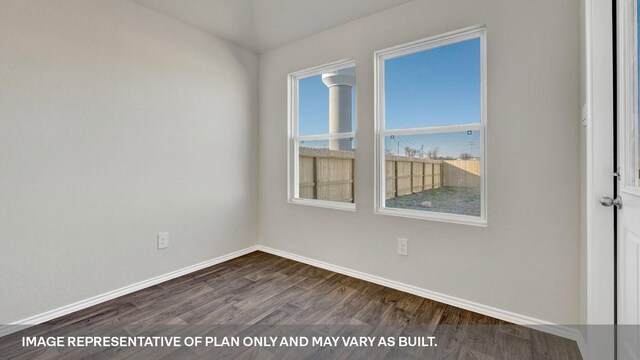 empty room featuring dark hardwood / wood-style floors