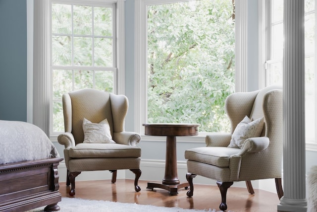 sitting room with light hardwood / wood-style flooring