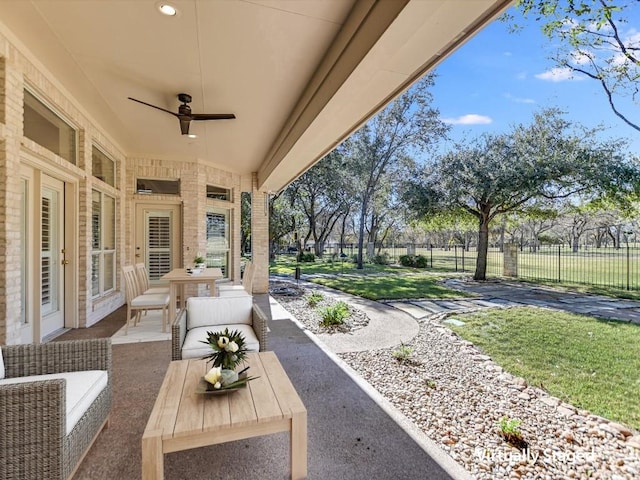 view of patio / terrace with outdoor lounge area and ceiling fan