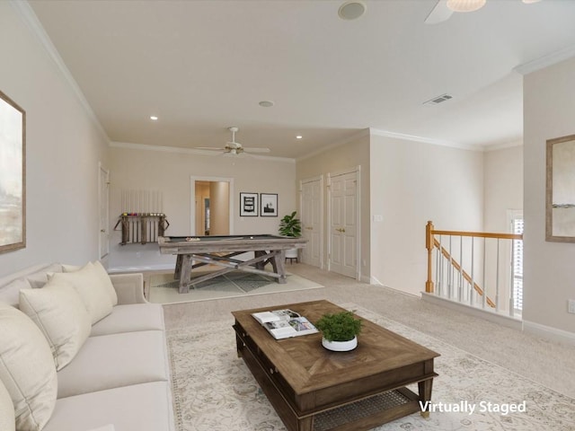 carpeted living room with ceiling fan, crown molding, and billiards