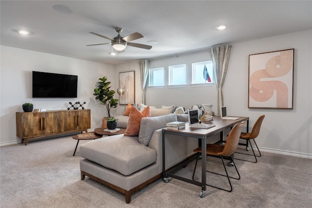 living room with light carpet and ceiling fan