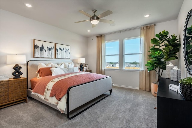 carpeted bedroom with ceiling fan