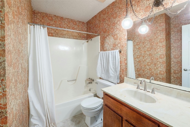 full bathroom with shower / bathtub combination with curtain, tile patterned floors, a textured ceiling, toilet, and vanity