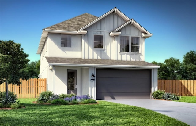 view of front of house with a garage and a front lawn