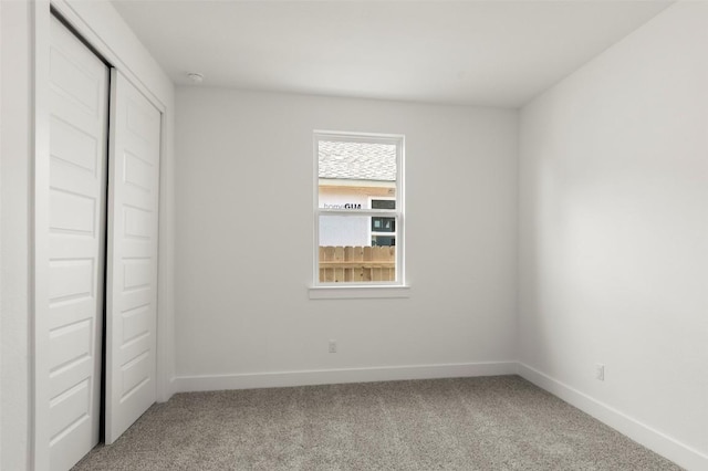 1117 Yaupon Holly Dr, Georgetown, TX 78628 - unfurnished bedroom with baseboards, carpet flooring, and a closet