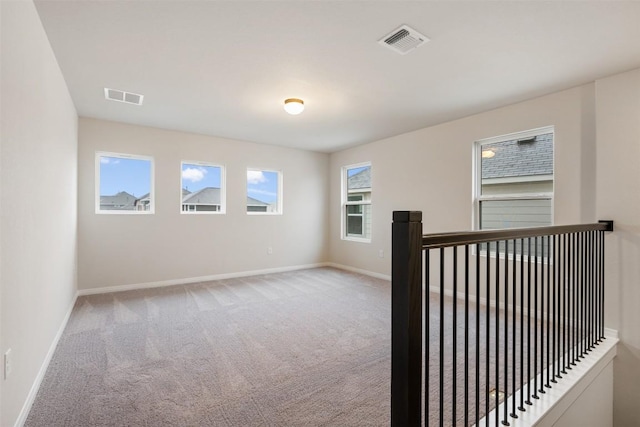 empty room with light carpet