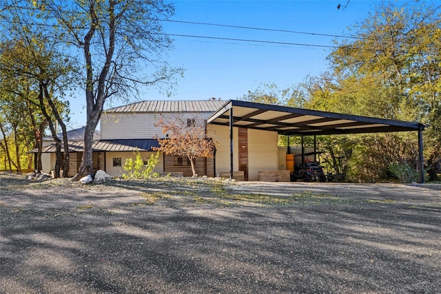 view of front of house with a carport