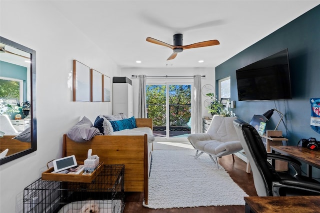 living room with ceiling fan