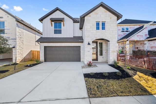 view of front of property featuring a garage