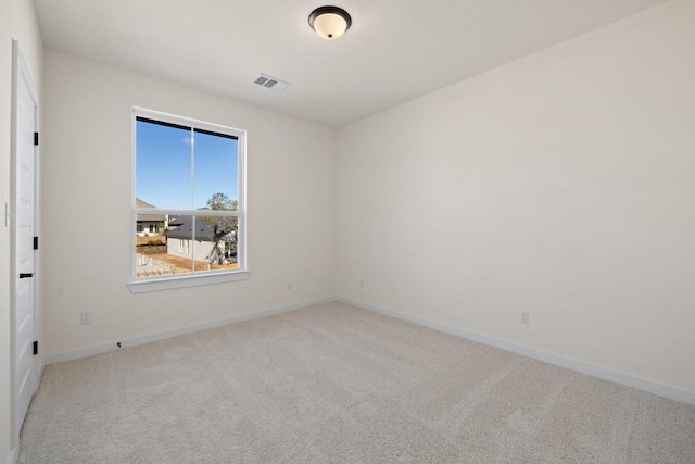 view of carpeted spare room