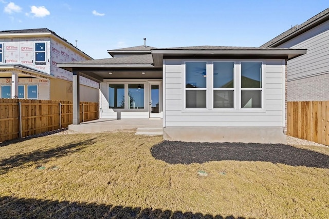 rear view of property with a patio area