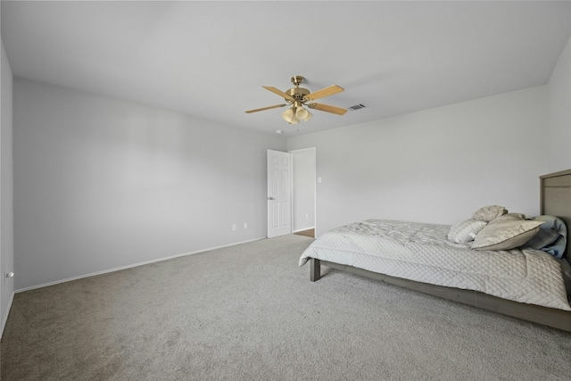 unfurnished bedroom featuring carpet flooring and ceiling fan